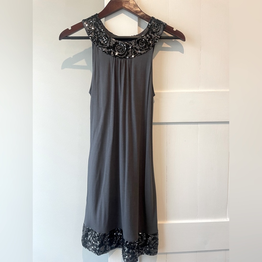 This dress can be worn casual or dressy. It has pockets on the side.